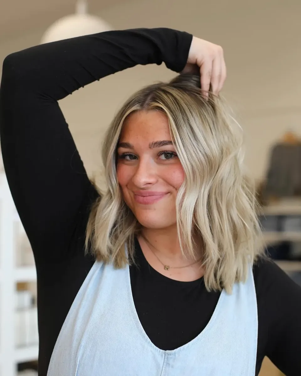 Blonde lob with lived-in roots